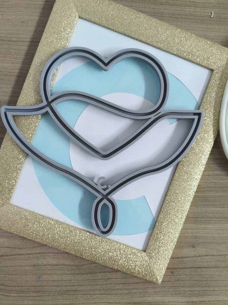 Telaio cuore alato